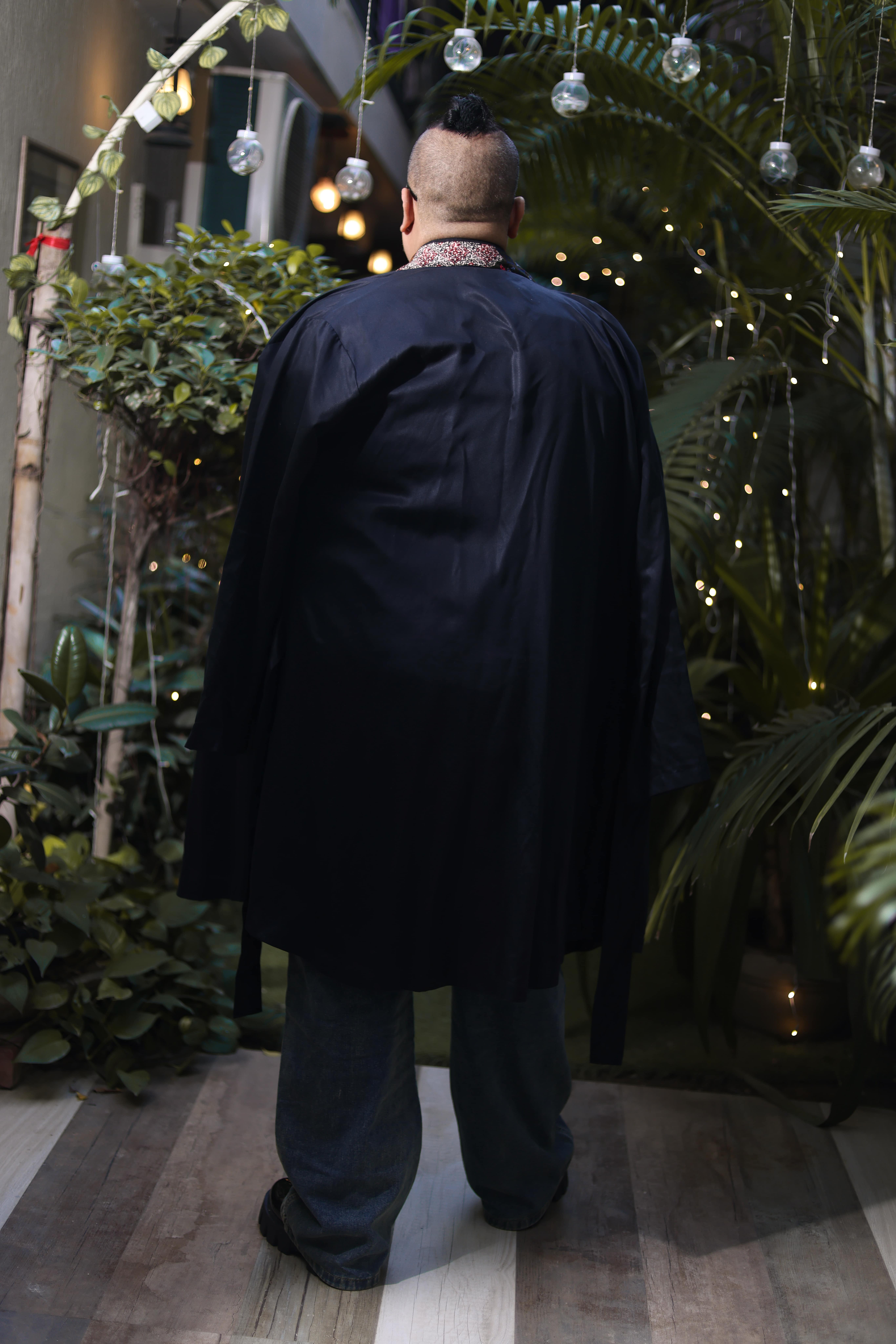Classic Black Denim Overshirt with Button Closure and Utility Pockets Paired with Relaxed-Fit Blue Jeans - Image 6